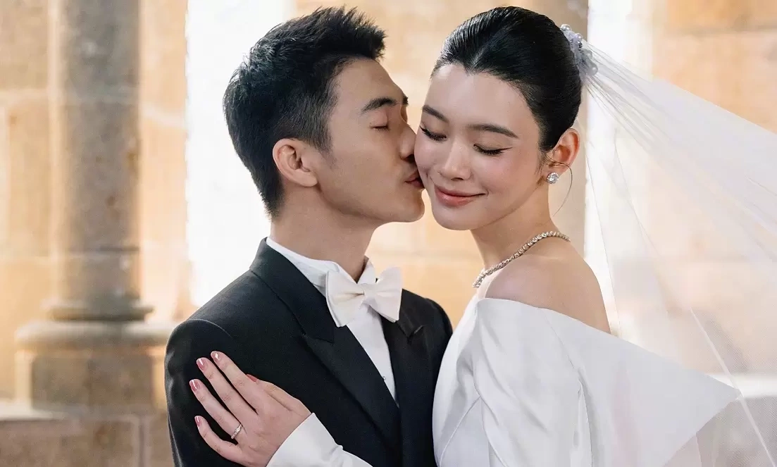 Váy cưới thuần khiết của con dâu tỷ phú và xu hướng giải trí kết nối người Việt - hình ảnh - 789betjl.com